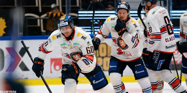 Erik Josefsson tröja hissas upp 