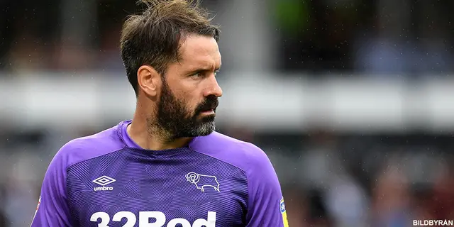 Scott Carson lägger handskarna på hyllan